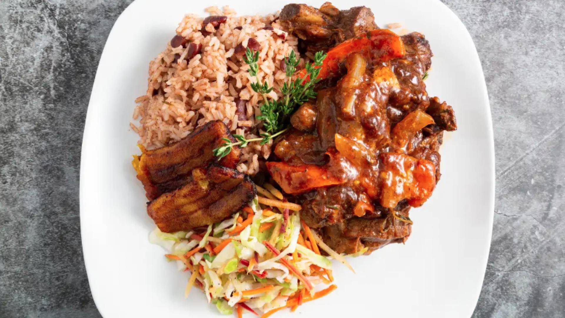 Jamaican Brown Stew Chicken,Rice & Peas w/Plantain & Cabbage Slaw