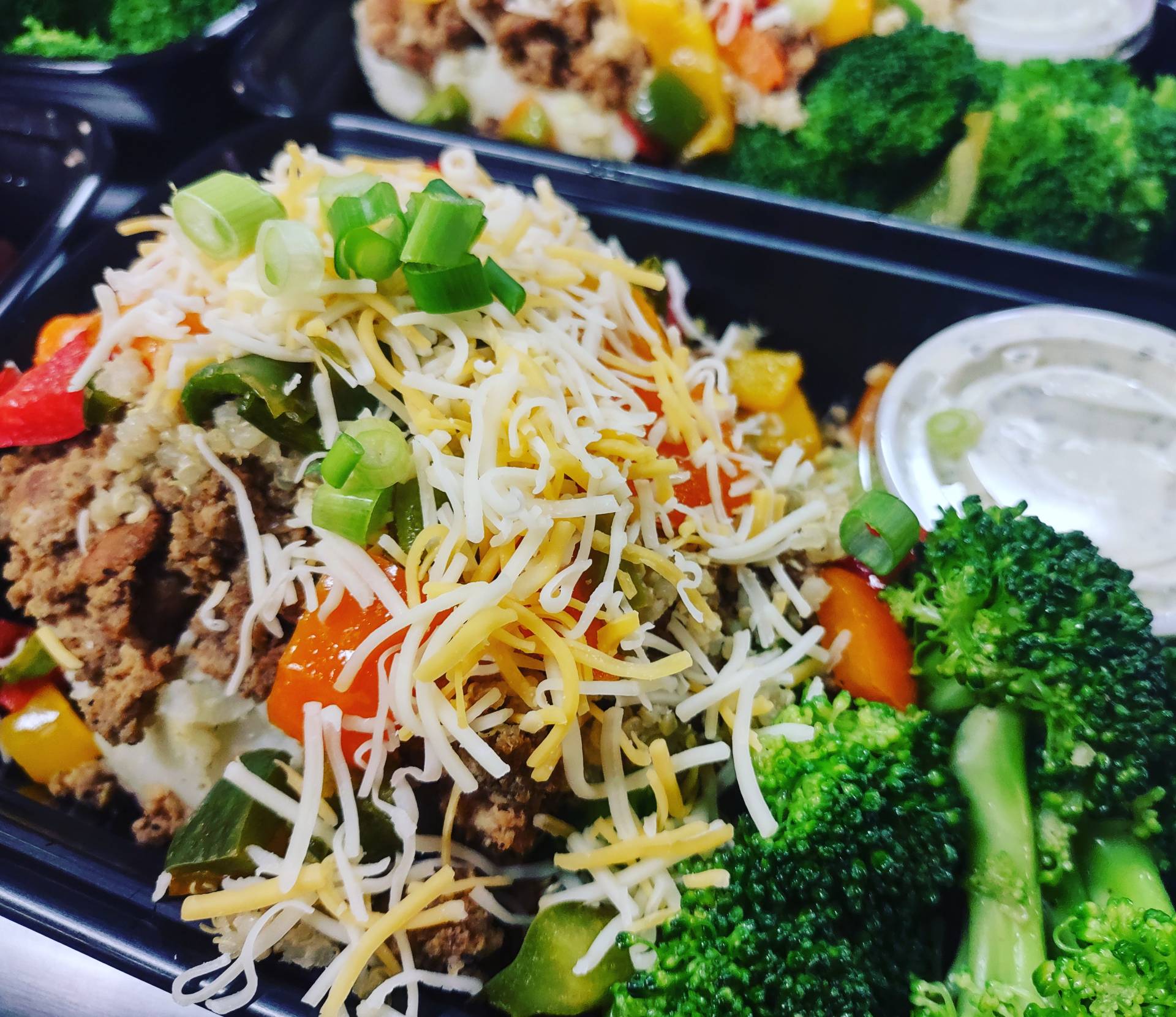 KETO-Loaded Broccoli w/ Seasoned Grass-fed Beef, Roasted Peppers, Blended Cheddar, Pumpkin Seeds & Green Onions...Ranch Sauce.