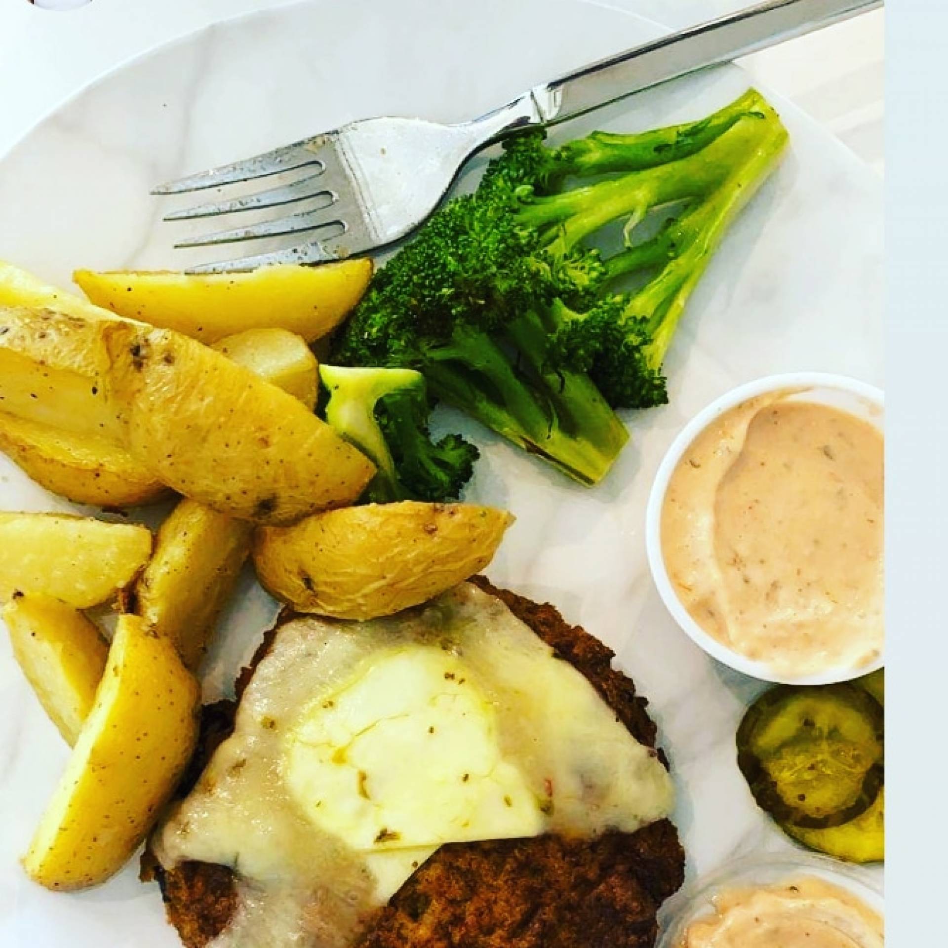 Red Pepper Turkey Burger w/Cheese, Pickles & House Aioli...Baked Fries &  Fresh Broccoli Florets.